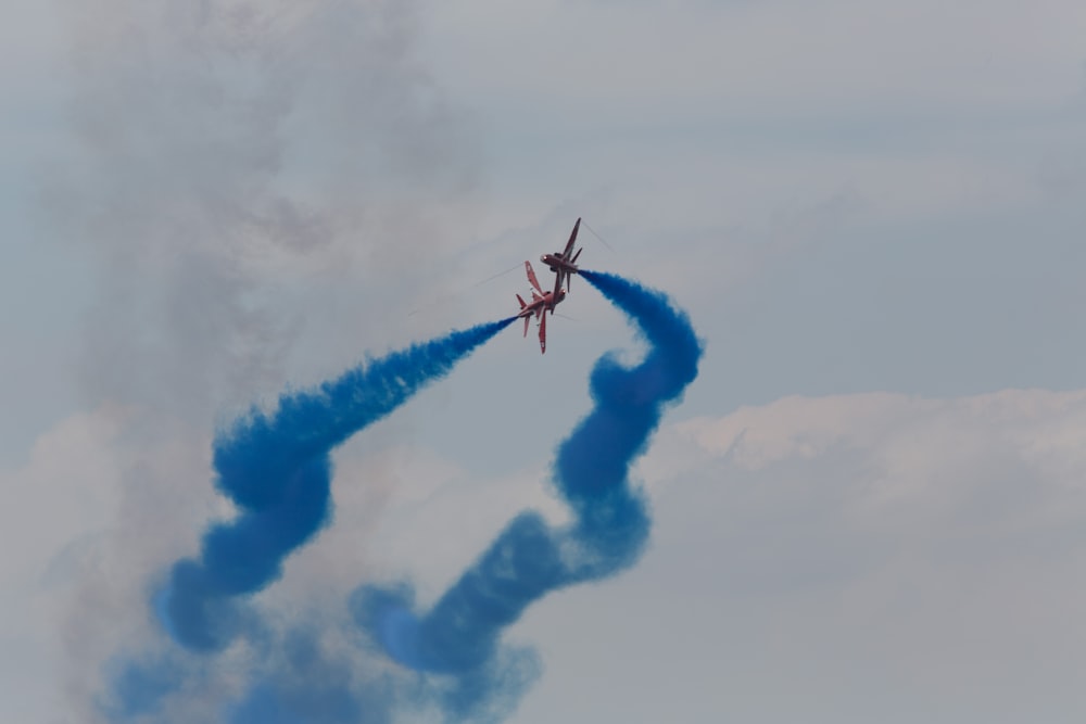 two planes flying in the sky