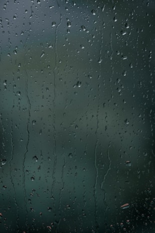 Clean lenses with water droplets showcasing hydrophobic coating.