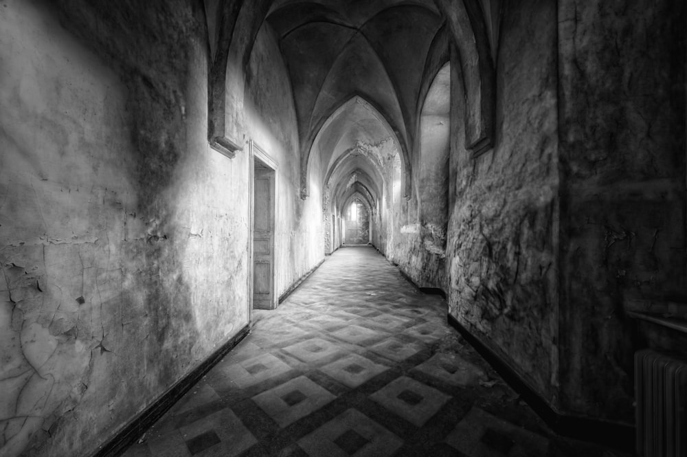 a stone hallway with a stone floor