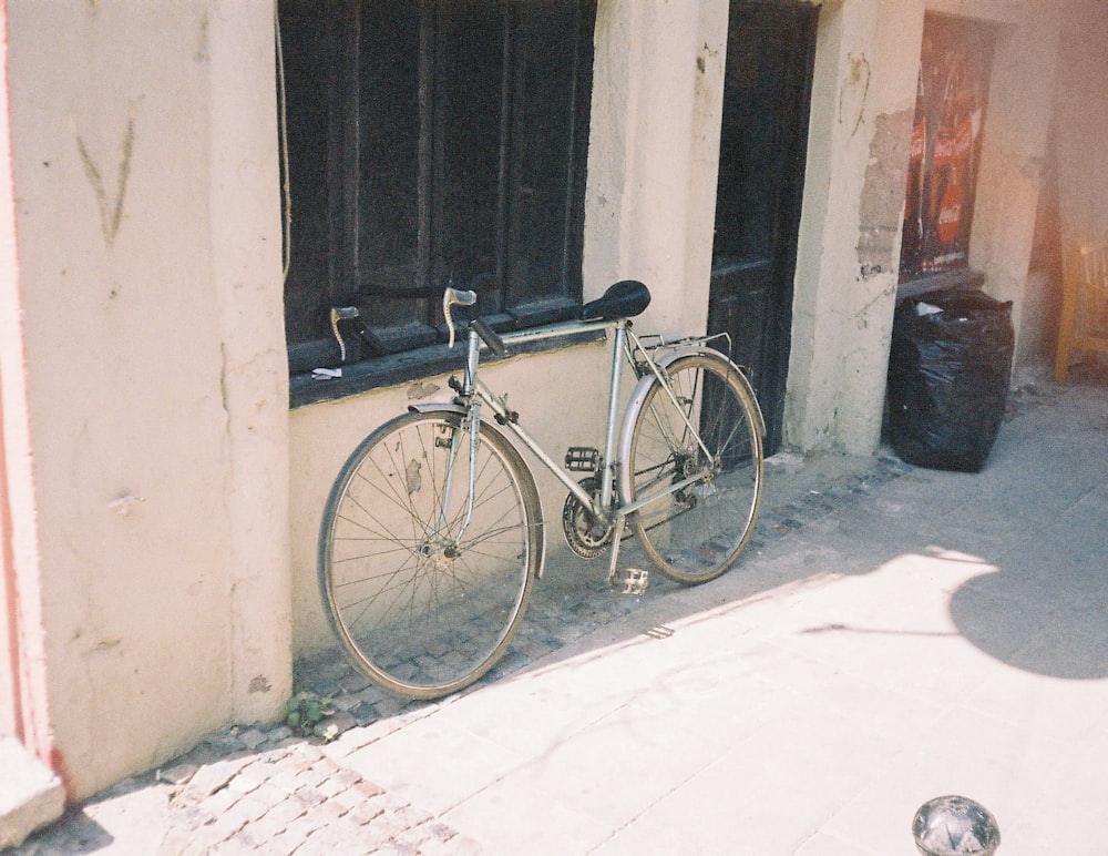 a bicycle parked in front of a building