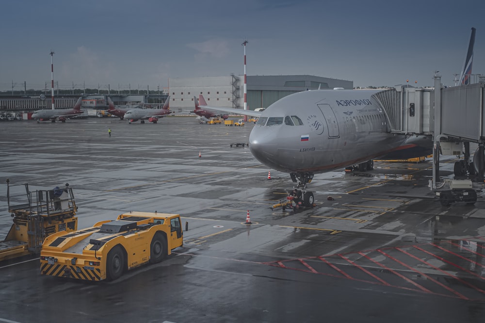 a truck next to an airplane