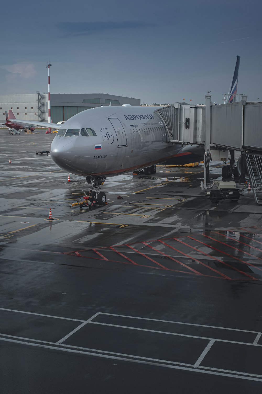 an airplane is parked at an airport