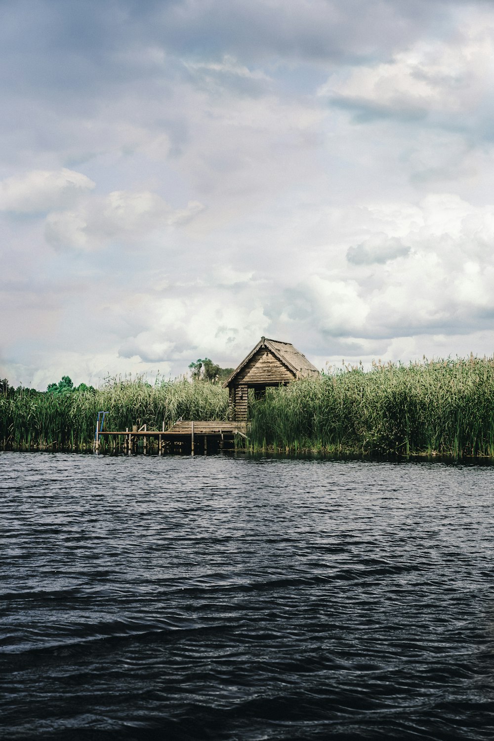 a building on a dock over water