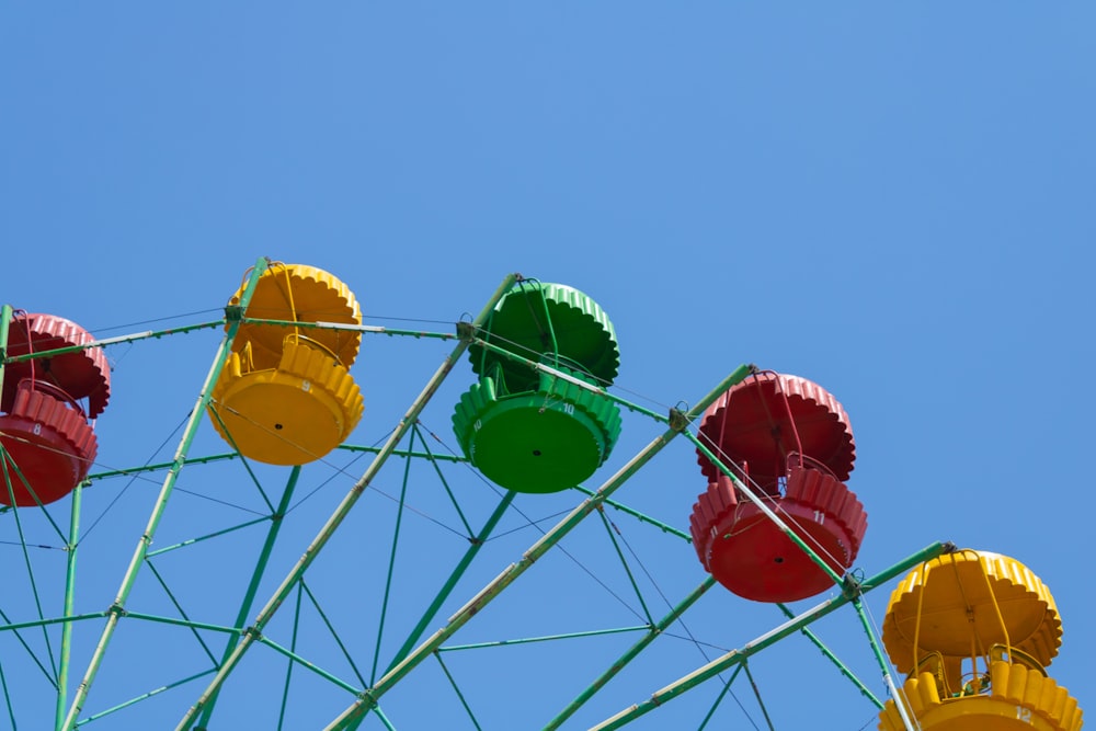 a ferris wheel with colorful seats