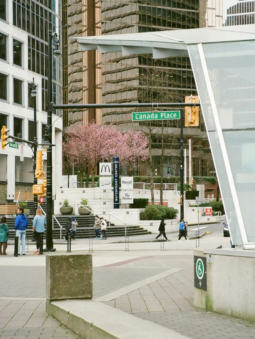 people walking on the sidewalk