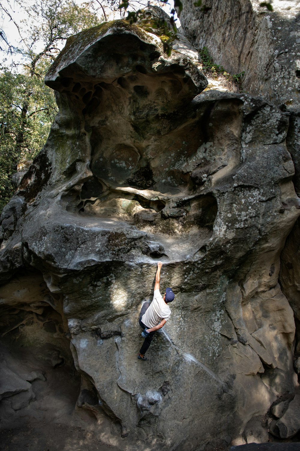 a person climbing a rock wall
