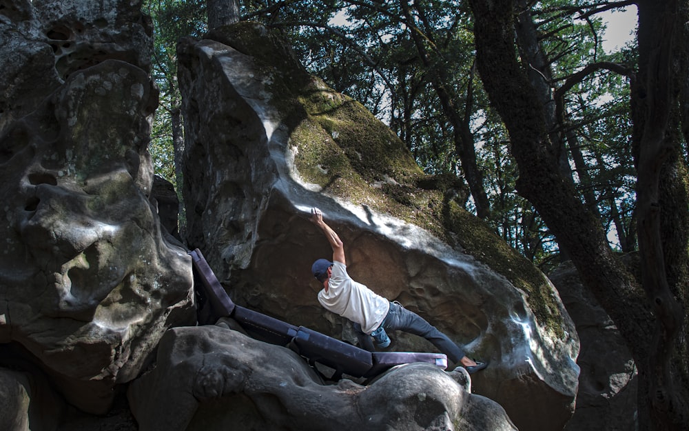 a person climbing a rock