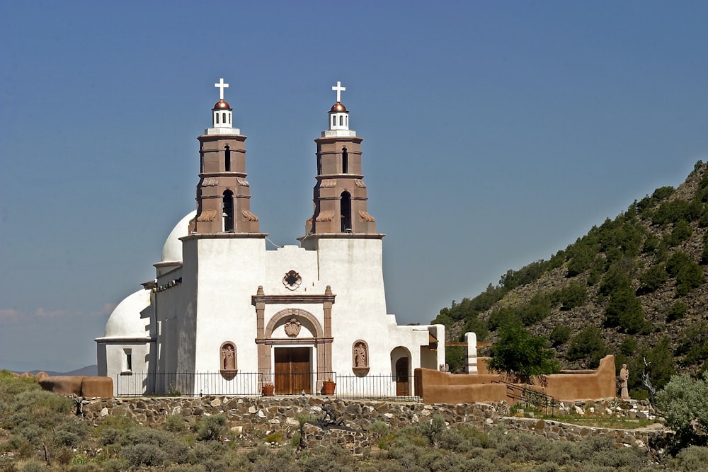 a white building with a cross on top