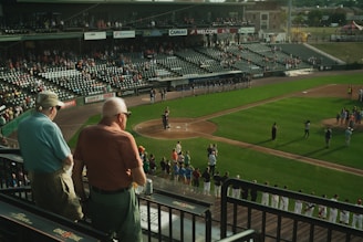 An action shot of a sports management team coordinating an event at the stadium.