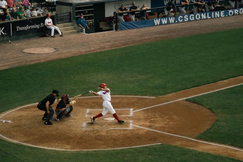 Baseball batter swinging at a pitch