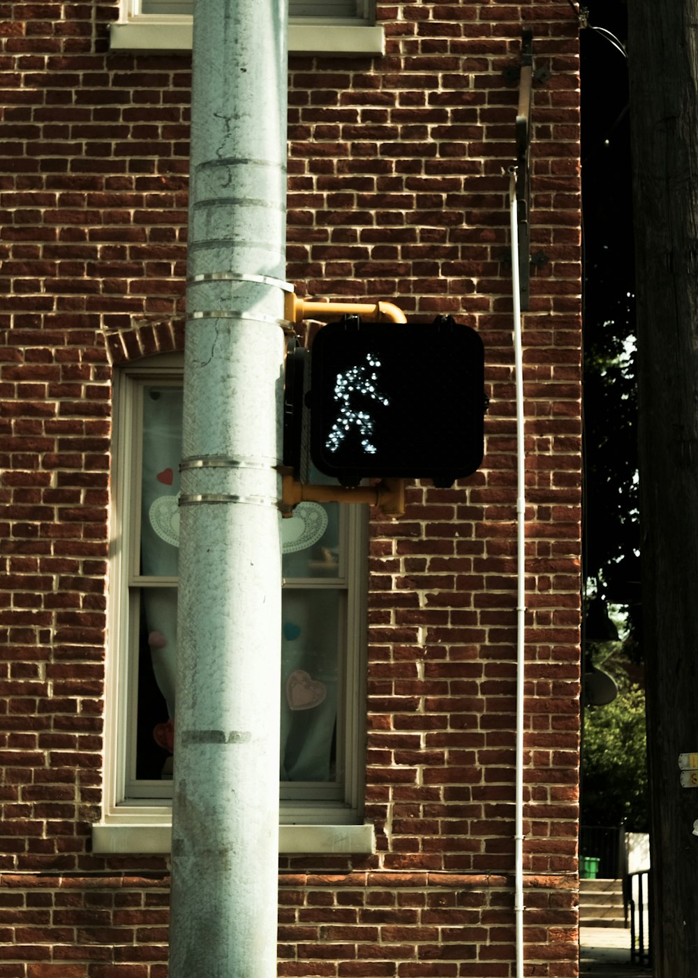 a traffic light hangs from a pole