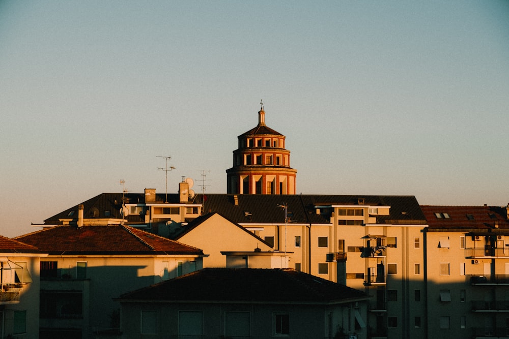 a group of buildings with a tower