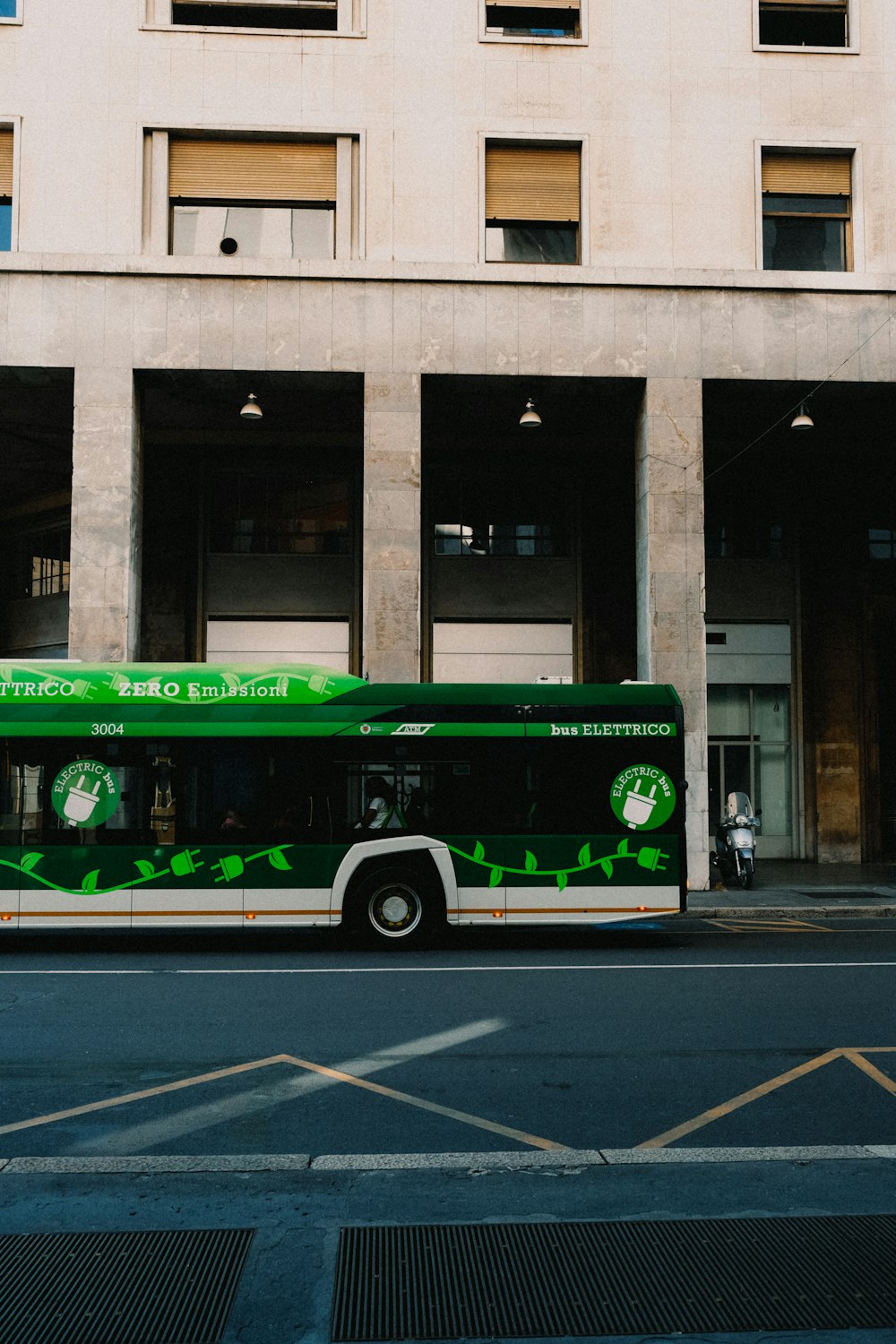 a bus parked in front of a building