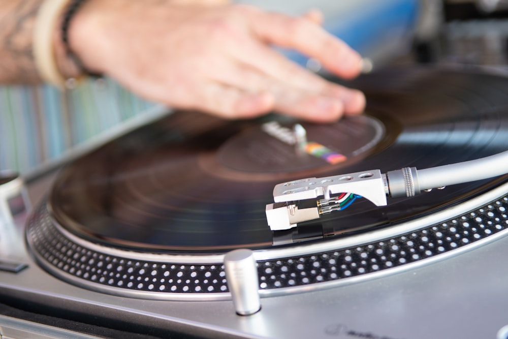 a person playing a record