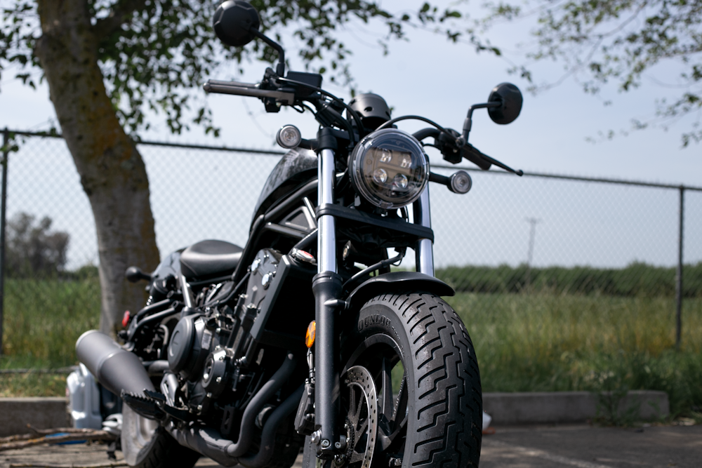 a motorcycle parked on the side of a road