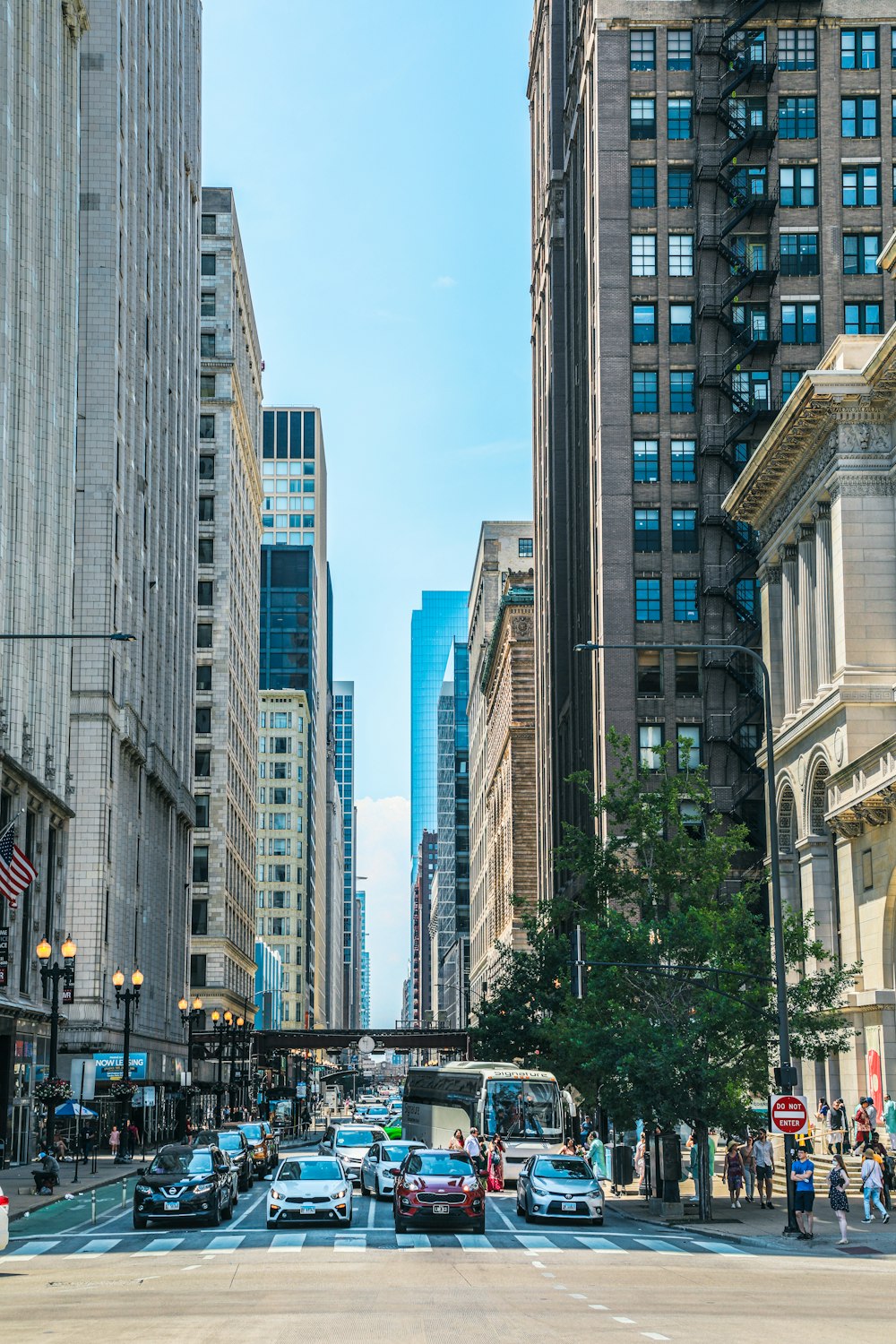 a city street with tall buildings