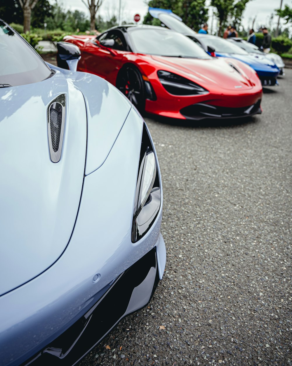 a group of cars parked on a street