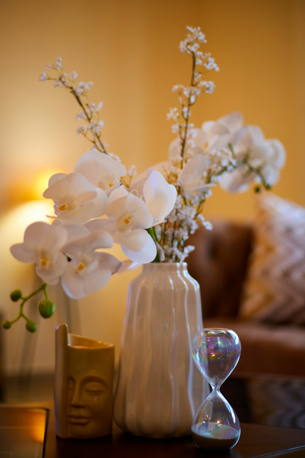 a vase with white flowers