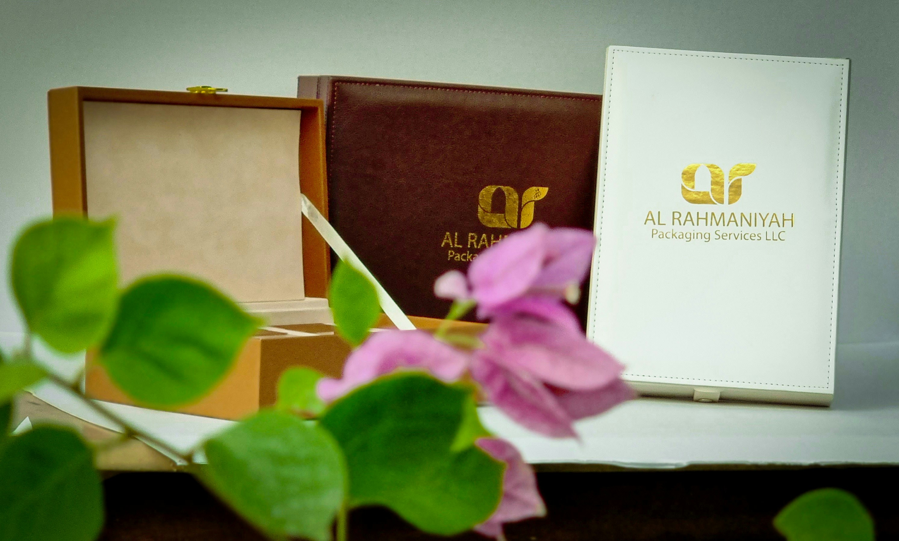 a flower next to a book