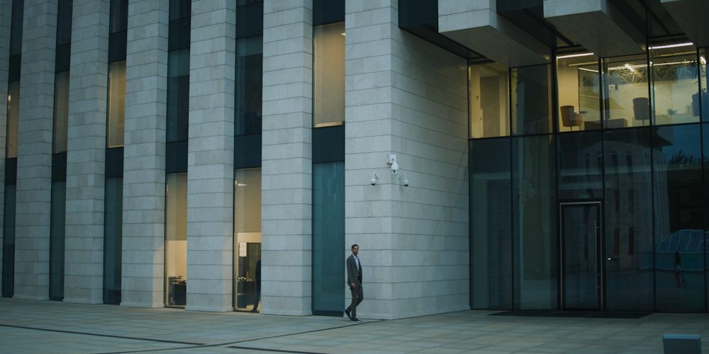 a person walking outside of a building