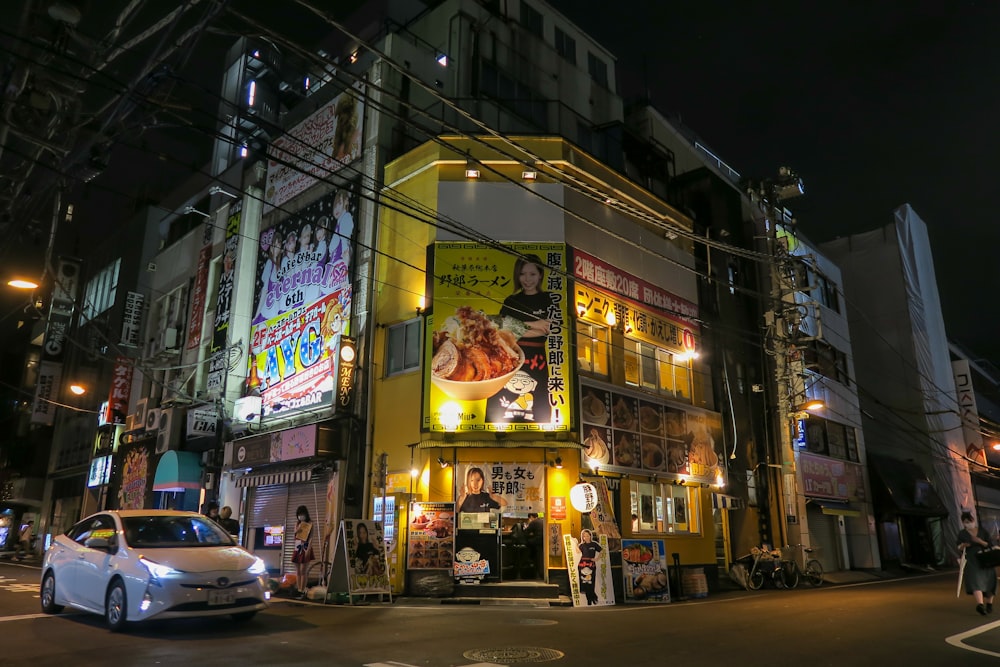 a street with buildings and cars