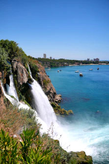 a waterfall into a body of water