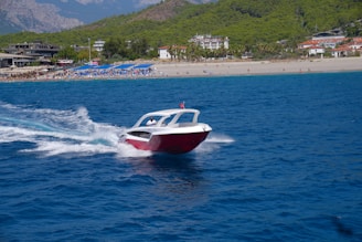 a boat travels across the water