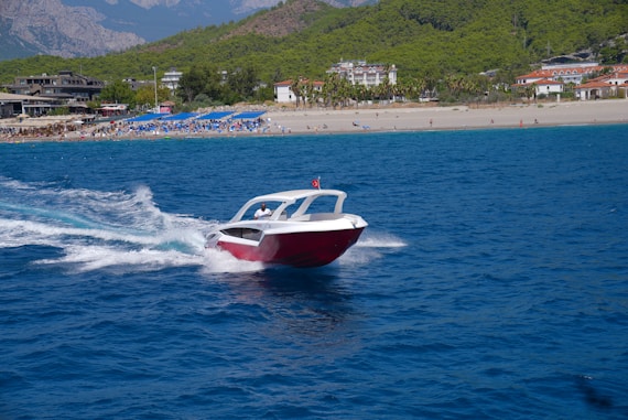a boat travels across the water