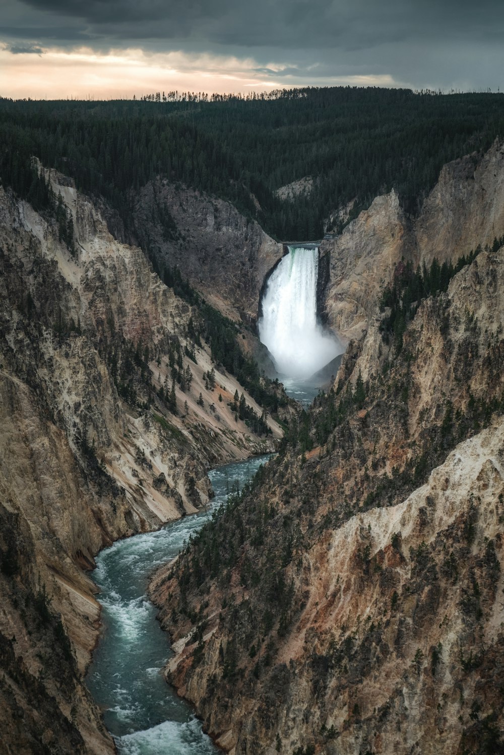 a waterfall in a canyon