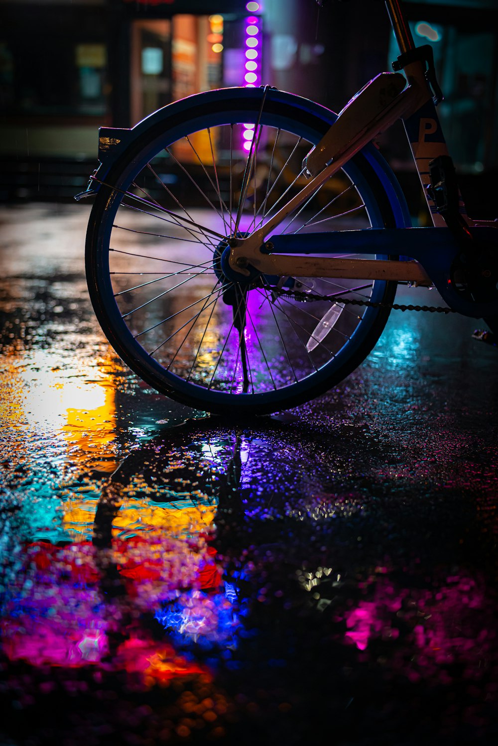 a bicycle parked on a sidewalk