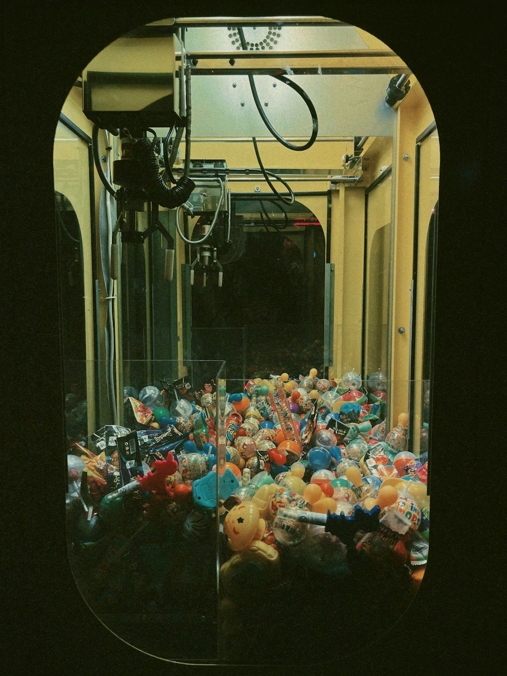 a large group of rubber ducks in a hallway