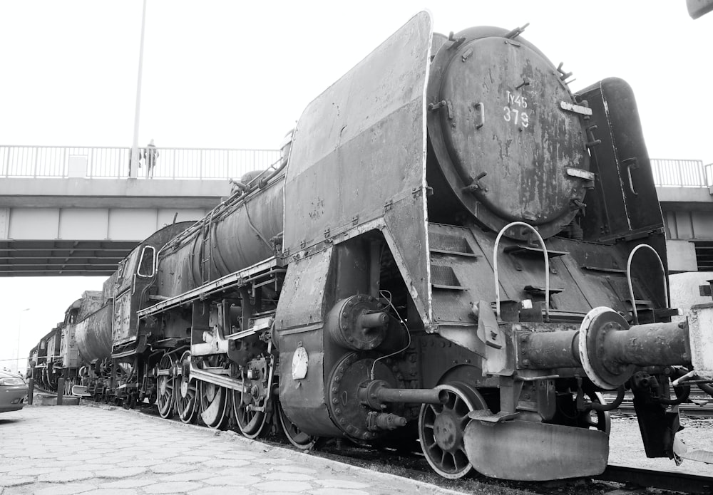 a black train on the railway tracks