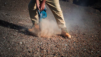 a person holding a bucket