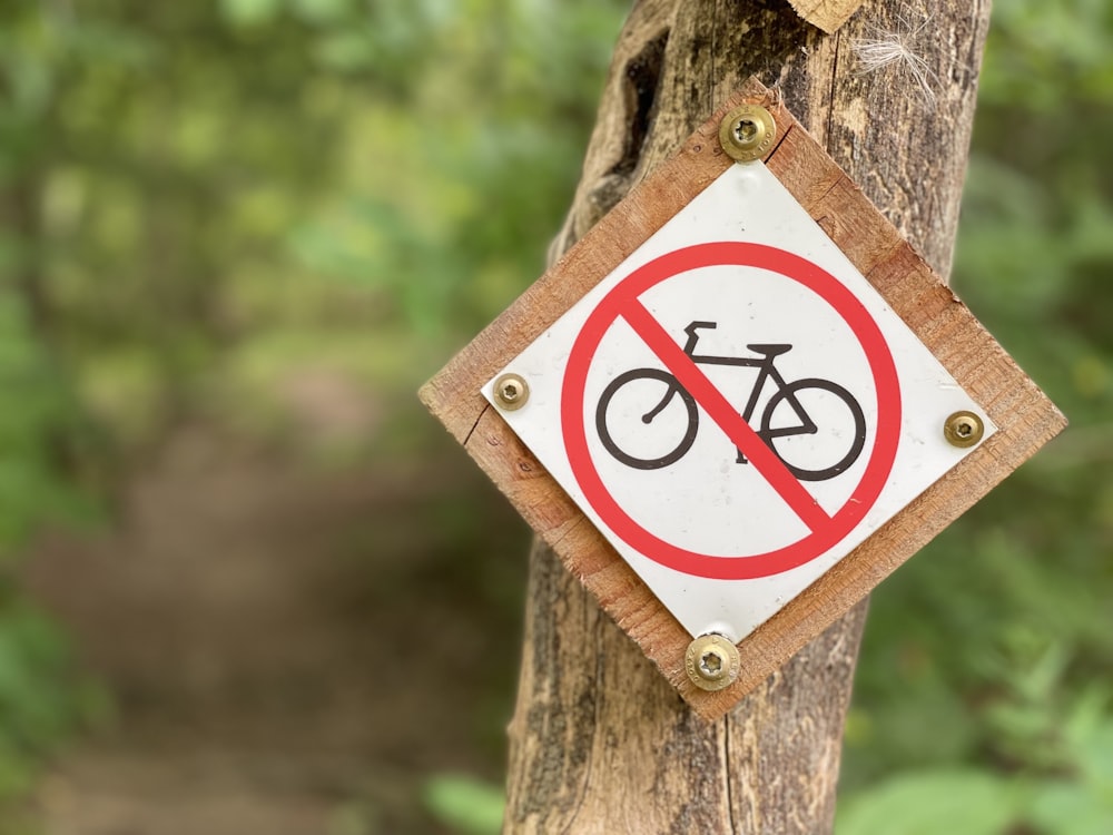 a sign on a tree