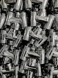 Various steel accessories arranged neatly.