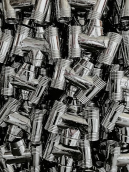 Sanitary pipes and fittings carefully arranged, highlighting quality and variety.