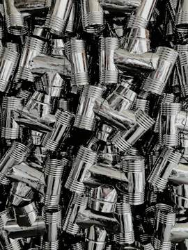 Close-up of professional pipe fitting assembly in a modern retail environment.