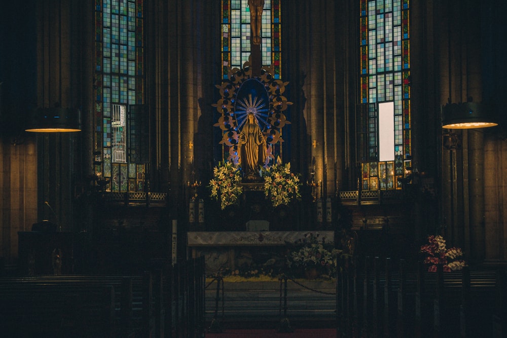 a large stained glass window in a church