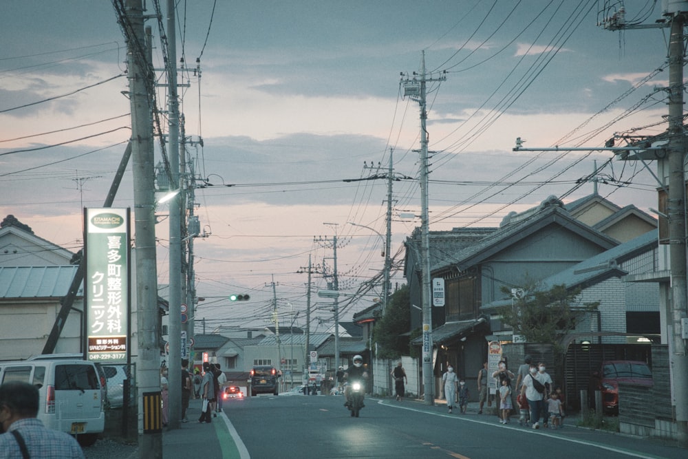 a busy street with people and cars