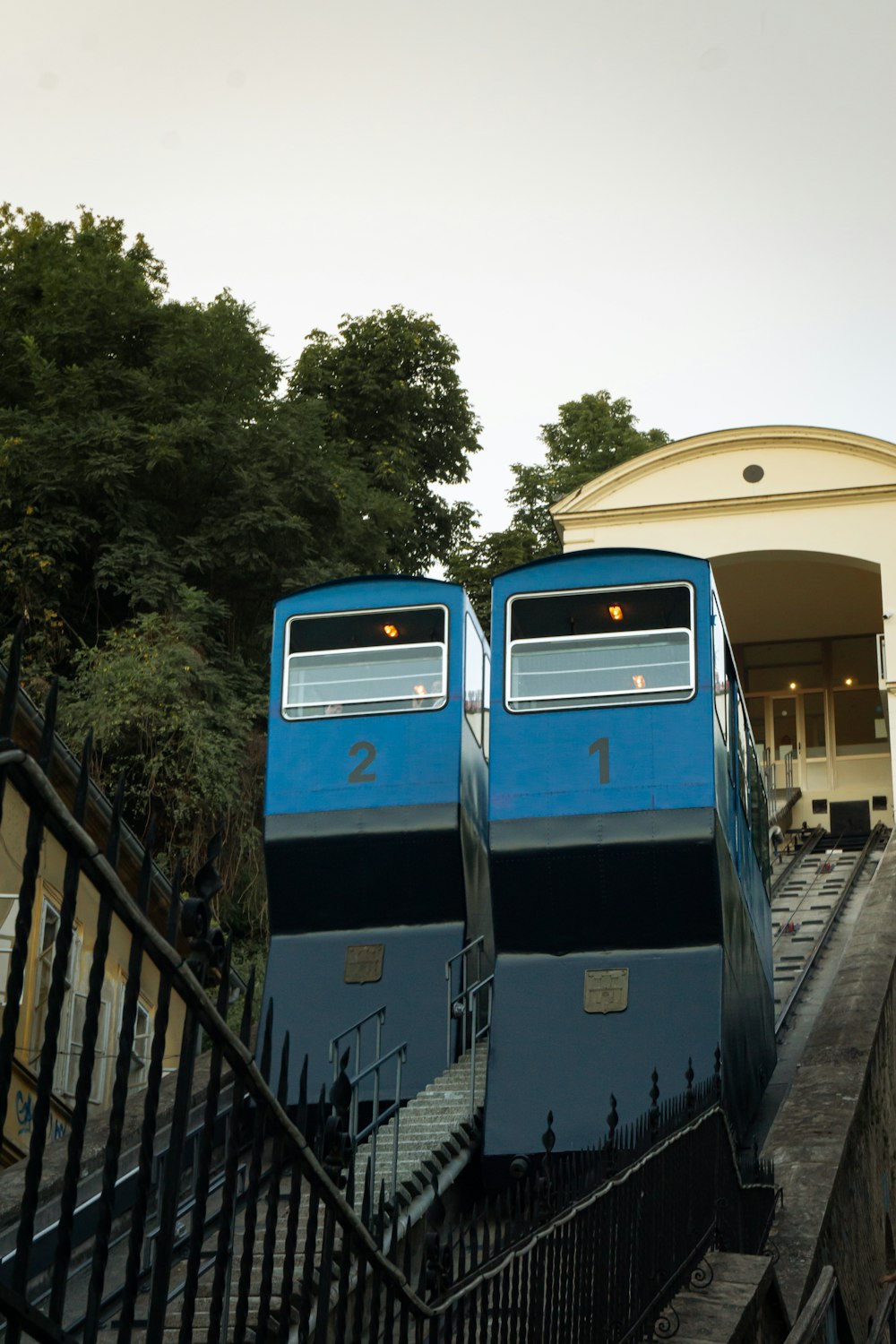 a blue train on the tracks