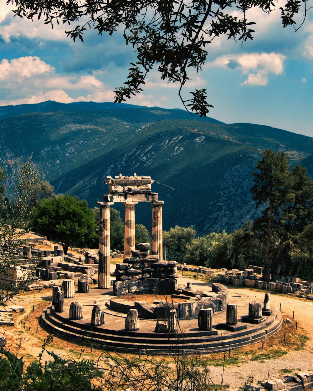 a cemetery with Delphi in the background