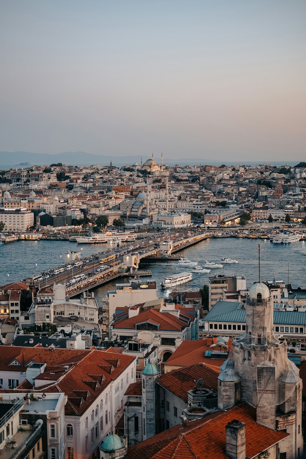 a large body of water with a city in the background