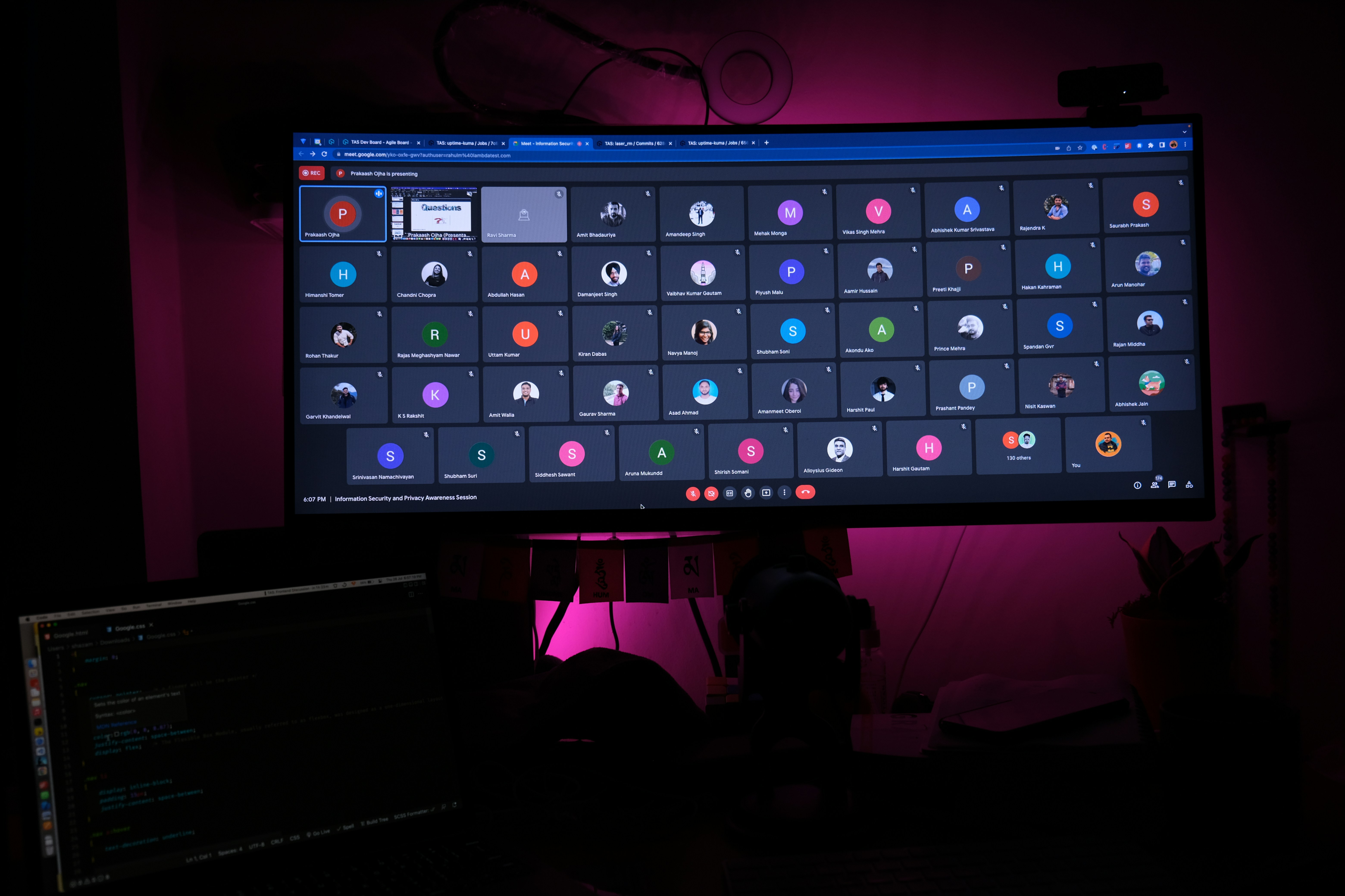 Virtual webinar session showing presenter and online participants grid