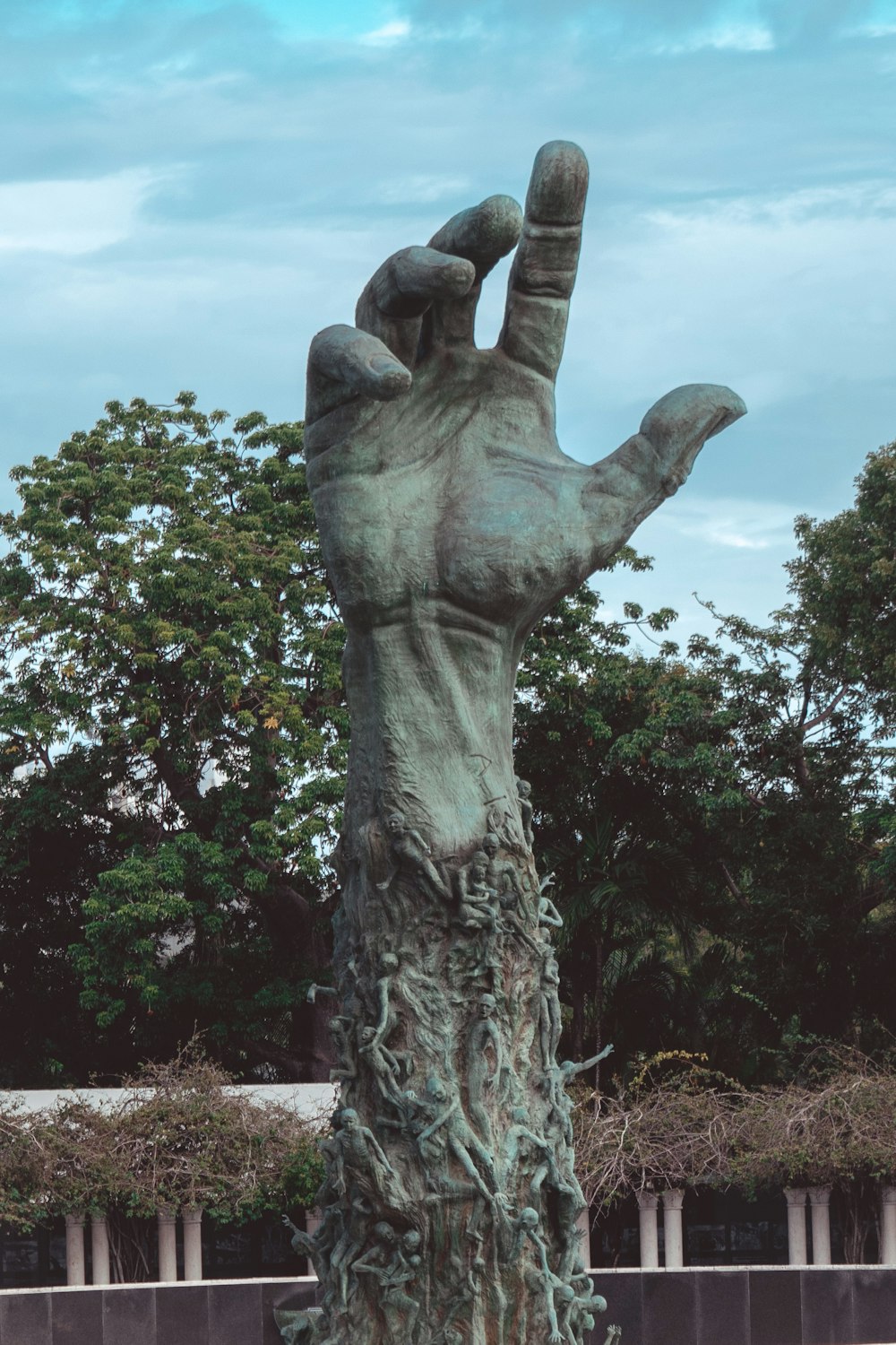 a statue of a person holding a sword