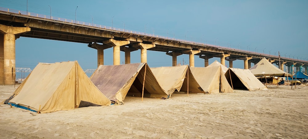 a bridge with a group of tents