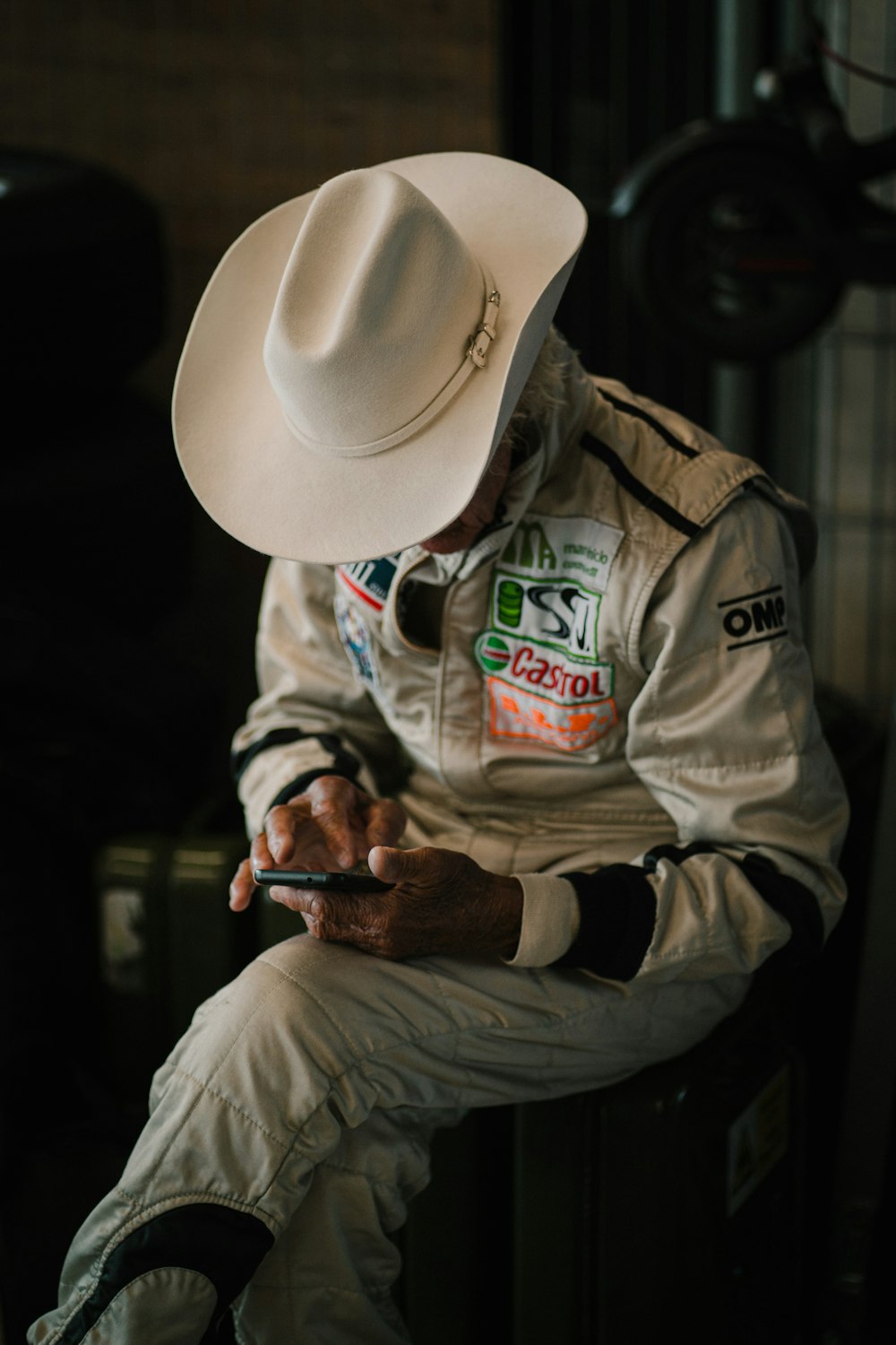 a person in a military uniform looking at the phone