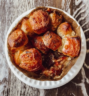 Close-up of the crispy, buttery layers of crescent dough wrapped around juicy mini sausages.