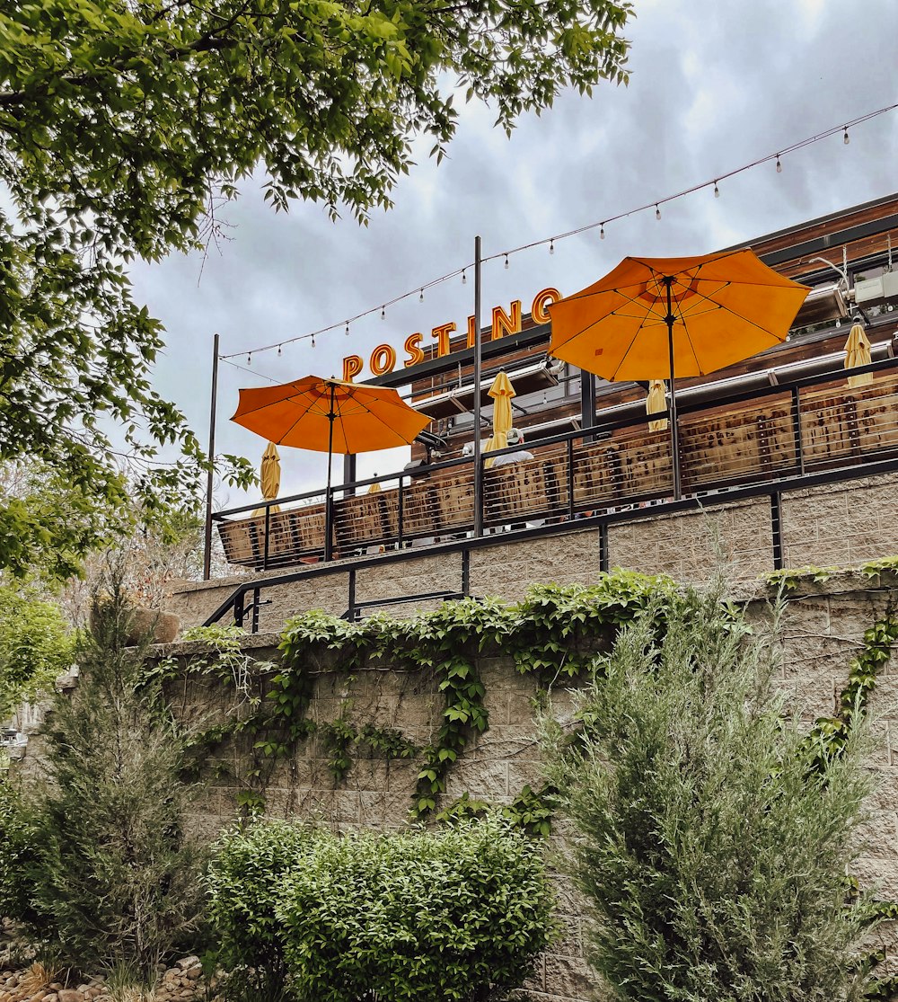 a bridge with umbrellas