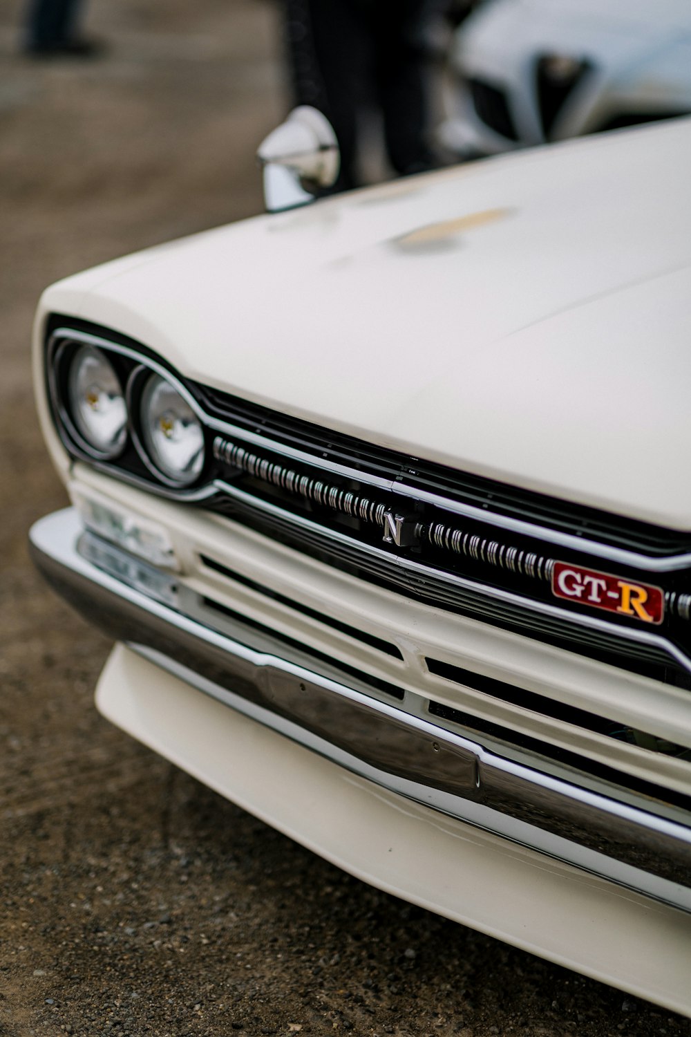 the front of a white car