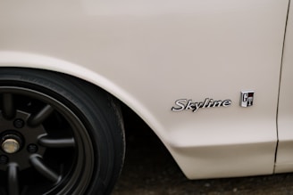 Customer's R32 Skyline GTR with a fresh paint job and new Skyline Parts Hub decals.